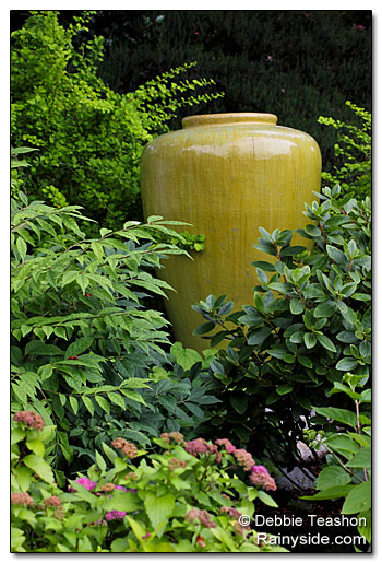 Large, narrow pot as a  garden focal point.